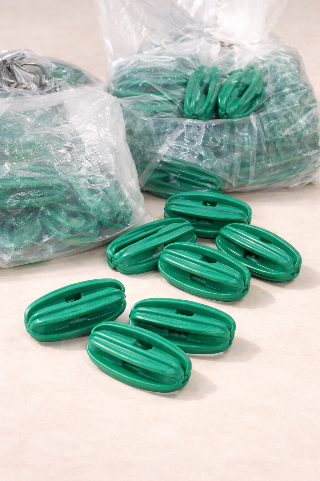 Plastic Green Strainer Insulator | Informed Systems Store Plastic Green Strainer Insulator